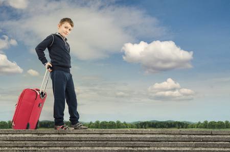 Little boy taking a beautiful journeyの写真素材