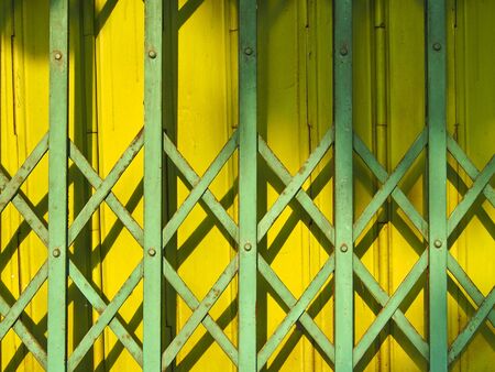 part of old style door in evening lightの写真素材