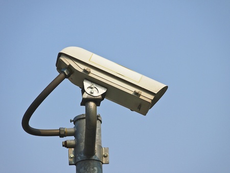side part of CCTV camera in blue sky