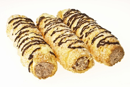 group of delicious bread chocolate cream horn on white background
