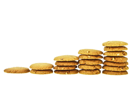 step of increase stack almond cookie on white backgroundの写真素材
