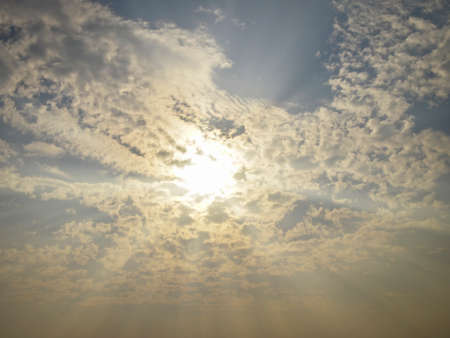 sun and ray of sunlight on cloudy skyの写真素材