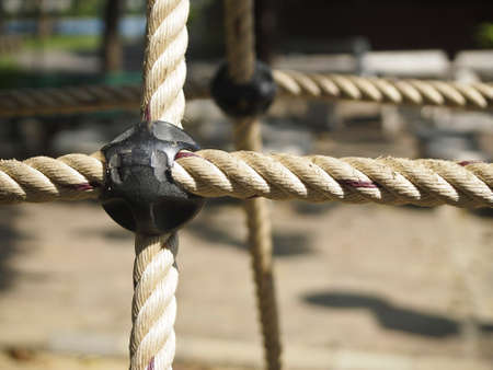 closeup details of big rope in climb toy at playground in park