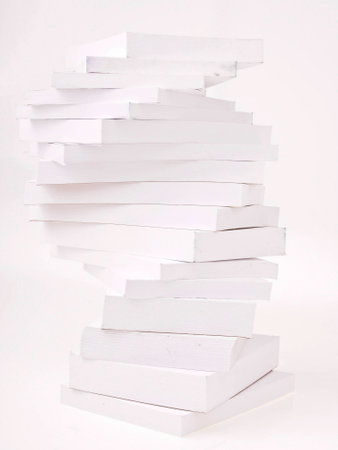 complex tower stack of white paper note on white backgroundの写真素材