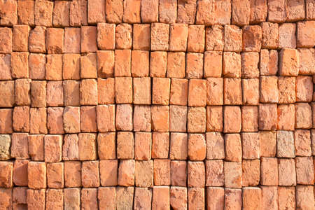 background of many stack brick in construction site