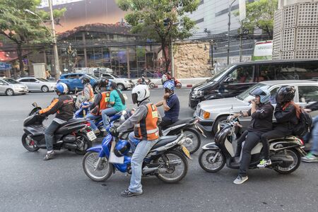 BANGKOK THAILAND - APR 29 : mortorbike stop on red light signal on Sukhumvit 31 road near Sawatdi Junction on april, 29, 2016, thailand. traffic jam is one of worse issue of Bangkokのeditorial素材