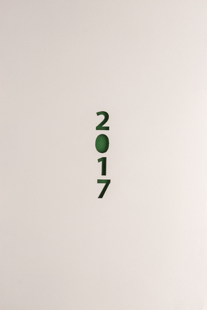 green vertical 2017 numbers cutting design card backgroundの写真素材