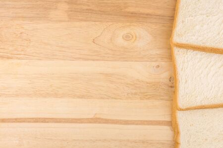 one side rim design by slide bread on wooden backgroundの写真素材