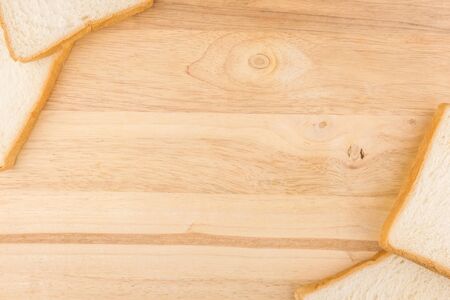 two conner design idea by slide bread on wooden backgroundの写真素材