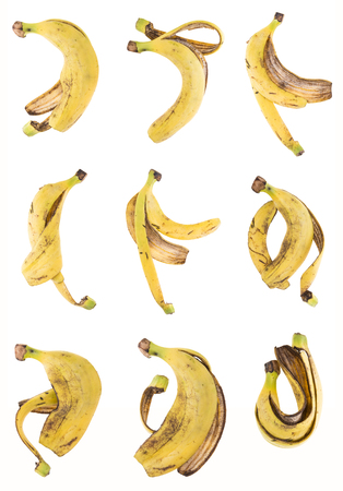 collection of Cavendish banana peel spread on white backgroundの写真素材
