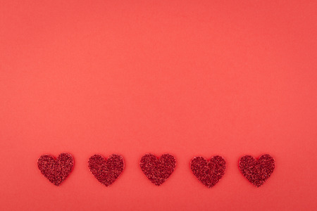 background of glitter red heart line on red paperの写真素材
