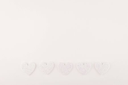 background of glitter white heart line on white paperの写真素材