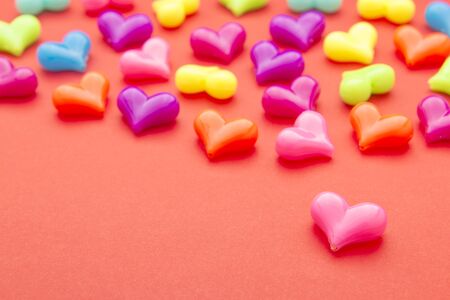 random array heart beads backgroung with red space in concept of loveの写真素材