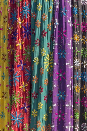 texture background of  indian style colorful textile in sunlight