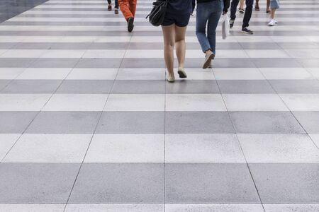 snap shot of walking pedestrian crowd on zebra wayの写真素材