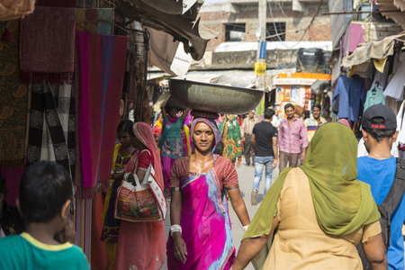 PUSHKAR INDIA-OCT 29 : working Unidentified indian outcast person in marketplace of Pushkar on october,29, 2014, indiaのeditorial素材