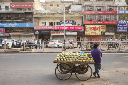 DELHI INDIA-JUN 17 : cantaloupe cart stall in morning time at chandni chowk, this area is in old delhi, that is famous place of Delhi on june, 17, 2015, indiaのeditorial素材