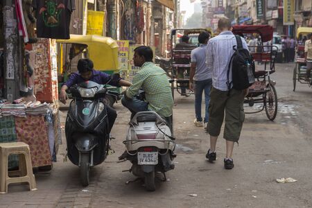 DELHI, INDIA - October, 5, 2014 :  scene of people at main bazar in paharganj. This place is main tourist hub of delhi.のeditorial素材