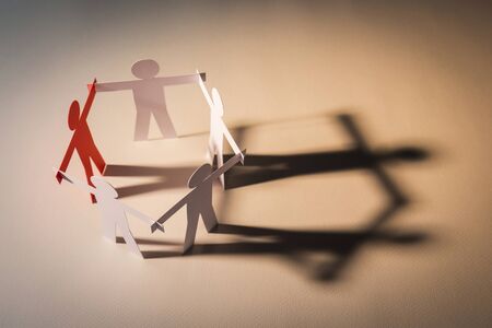 closed joining of five  paper figure on light background. in concept of business, cooperation and ...