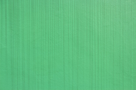 background of dirty stained line on green concrete wallの写真素材