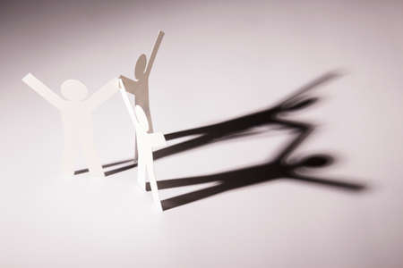 all in one joining of three both hand up paper figure on light background. in concept of business, cooperation and successful.の写真素材