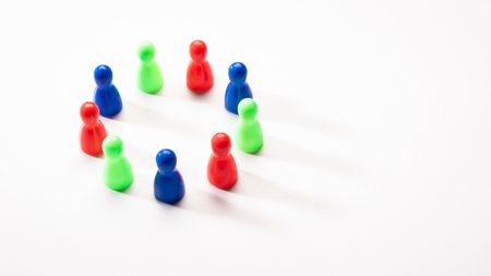 circle arrangement of nine mixed color plastic pin with red pin on white background, in concept of...