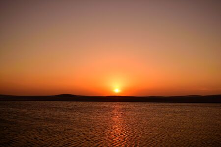 The dunes of the Lencois Maranhenses National Park at sunset, Brazil.の写真素材