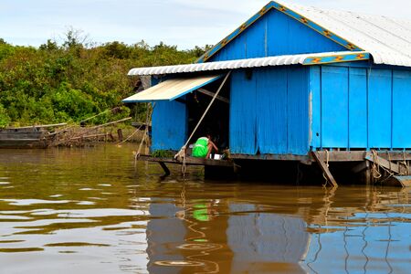 View of the amazing floating village of Kampong Khleang on the banks of Tonle Sap lake, Cambodiaの写真素材