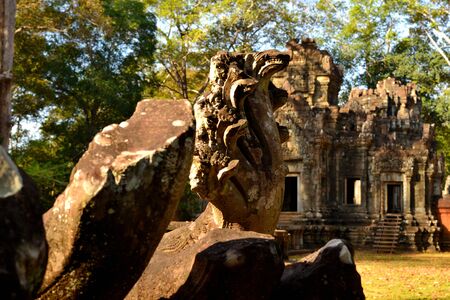 Closeup fa a Naga statue in the Angkor complex, Cambodiaの写真素材