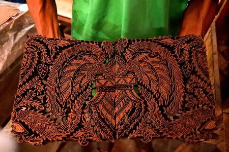 Closeup of some tools used to produce Batik fabric, Indonesiaの写真素材