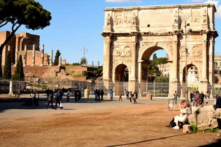 March 8th 2020, Rome, Italy: View of the Arch of Constantine with few tourists due to the coronavirus epidemicのeditorial素材