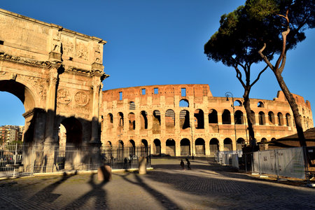 Rome, Italy - December 13th 2020: View of the Arch of Constantine and Coliseum with few tourists due to the Covid19 epidemicのeditorial素材