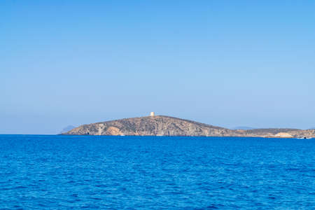 Beautiful view of the southern Sardinian sea. Note the historic Saracen tower on the rock...