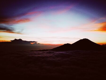 The Sunrise On The Volcano Batur On The Island Of Bali In Indonesiaの写真素材