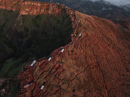 The Sunrise On The Volcano Batur On The Island Of Bali In Indonesiaの写真素材