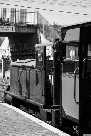 old train on the railway station in black and white. retro styleの写真素材