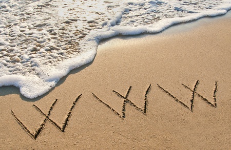 WWW written in the sand beach.の写真素材