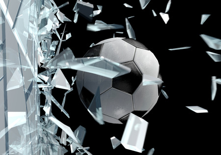 Three dimensional drawing of a soccer ball breaking glassの写真素材