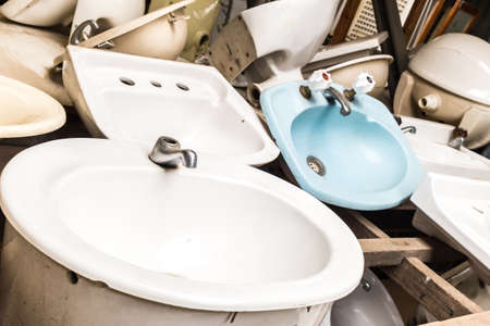 Large collection of ceramic bathroom sinks and tapsの写真素材