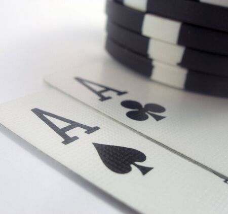 Poker chips and aces