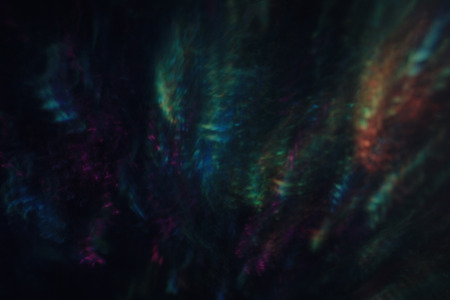 Dark bokeh with multicolored lights for backgroundの写真素材
