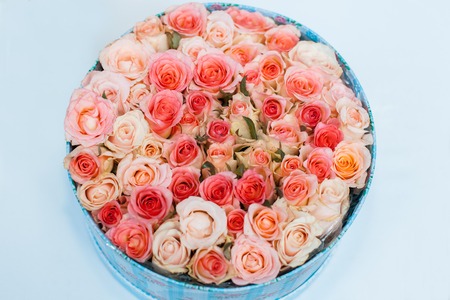 Many rose buds in a round box, wedding decorations
