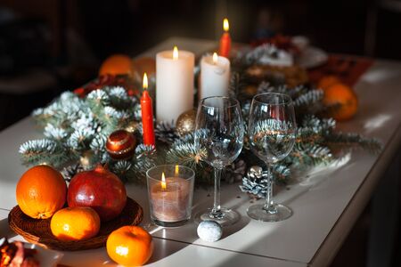 Decorating the dining room table to celebrate Christmasの写真素材