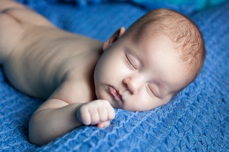 Portrait of a sleeping infant close upの写真素材