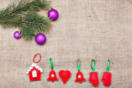 Christmas decoration handmade on a burlap backgroundの写真素材