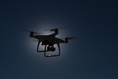 Copter against backlight. Copter against backlight. It is flying high in the skyの写真素材