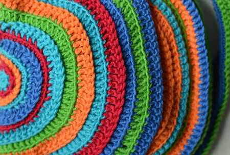 Handmade crocheted handbag close-up pattern of colorful linesの写真素材