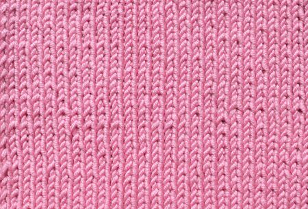 Pink knitted pattern background creative handmadeの写真素材