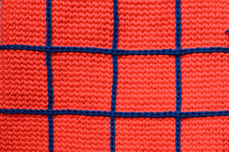 Checkered bright crocheted background - pink neon and blue cord, geometric pattern, handmade backgroundの写真素材