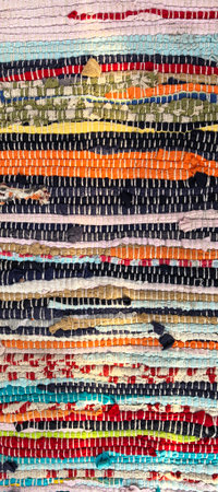 Colorful hand-woven rug as a background, closeup